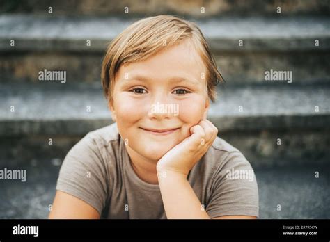 Outdoor Close Up Portrait Of 6 7 Year Old Boy Stock Photo Alamy