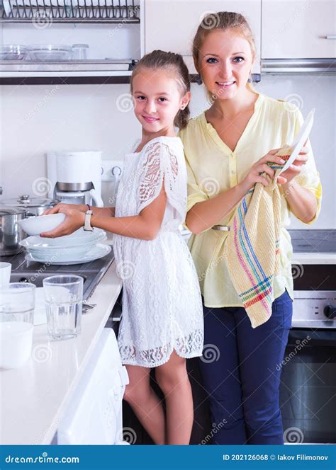 Woman And Girl Washing Dishes Stock Photo Image Of Child Flat 202126068