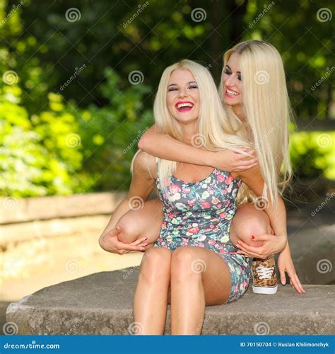 Two Seductive Blonde Girl Friends Stock Photo Cartoondealer