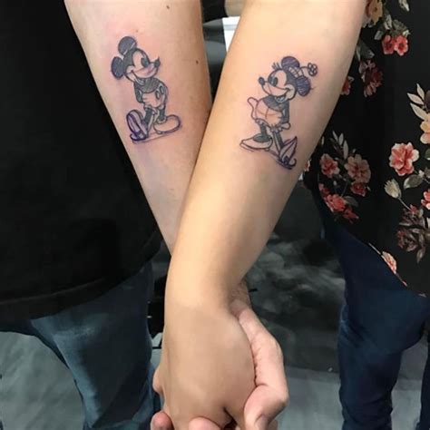 15 Disney Tattoos That Will Make You The Fairest Of Them All Mickey Tattoo Disney Tattoos