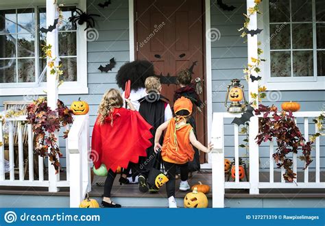 Young Kids Trick Or Treating During Halloween Stock Image Image Of