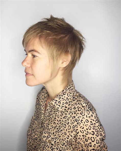 Modern Shaggy Mullet With Blonde Color And Choppy Bangs