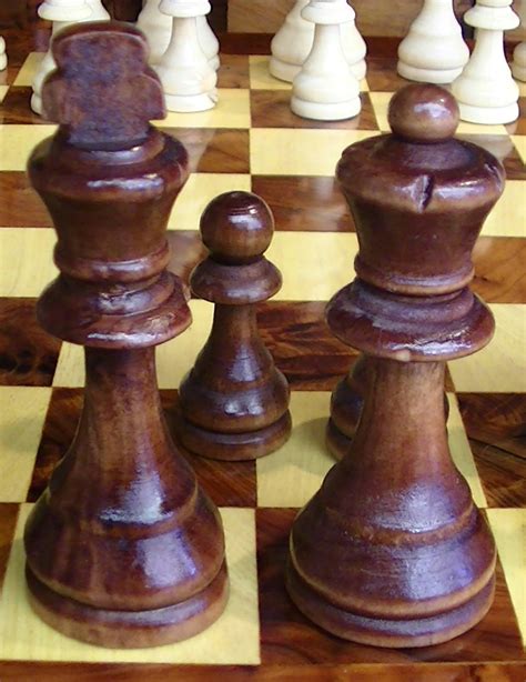 The queen must force the enemy king to the edge of the board and then the king comes to help the queen deliver checkmate. King And Queen Chess Pieces Free Stock Photo - Public ...