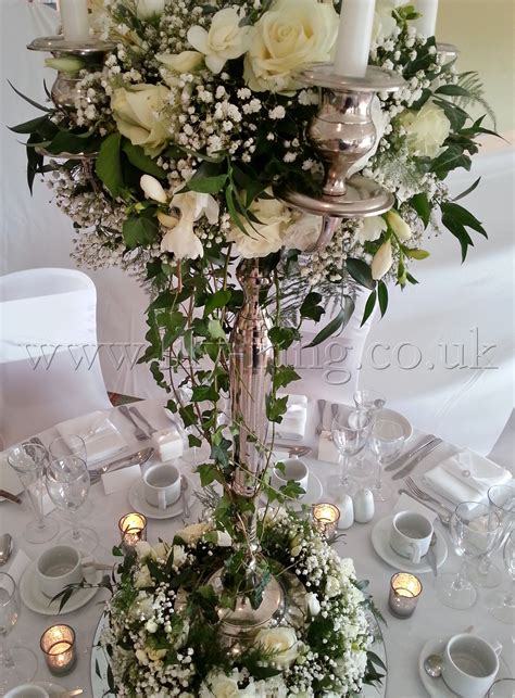 Gorgeous Winter Themed Candelabra With Trailing Ivy And Roses By Lily King Weddings Mariage