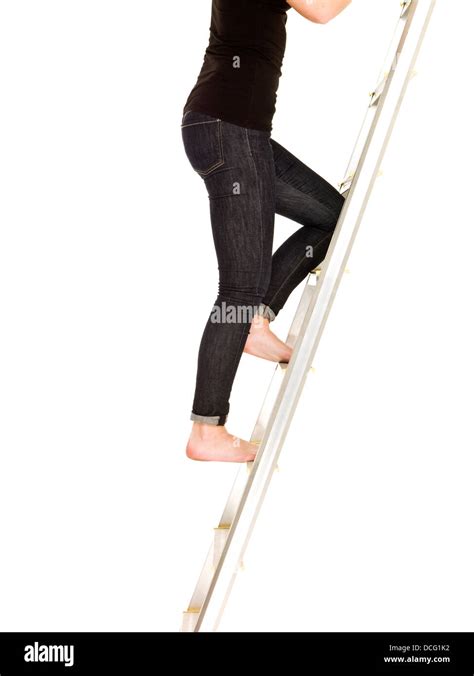 Woman Climbing Up The Ladder Stock Photo Alamy