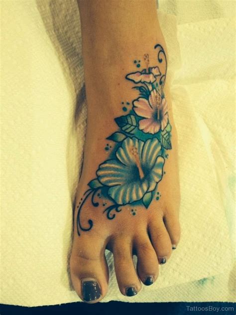 Wonderful Hibiscus Flower Tattoo On Foot Tattoo Designs Tattoo Pictures
