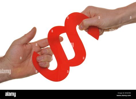 Man And Woman Hands Tugging At A Legal Citation Symbol Symbolic Image For Litigation Divorce