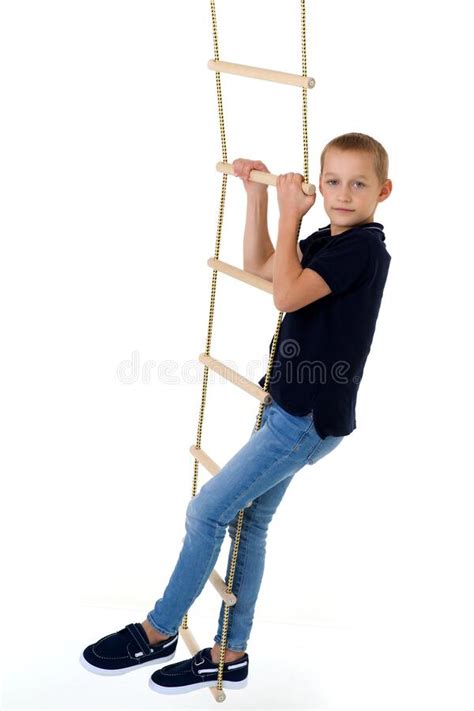 Teenage Boy Climbiing On Rope Ladder Stock Image Image Of Junior