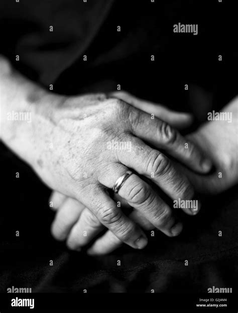 Elderly Hands Resting On Lap Black And White Stock Photos And Images Alamy