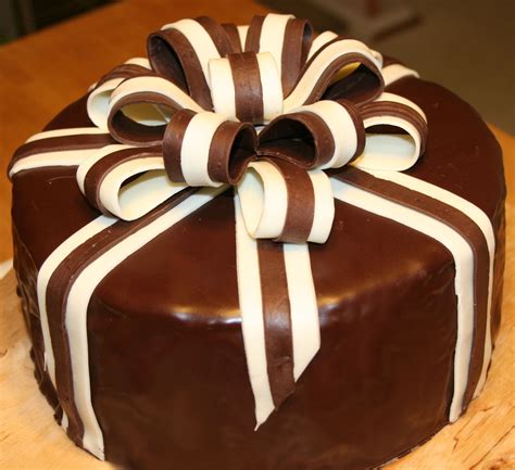 Buttermilk helps to keep the cake super moist while a white chocolate ganache offsets the richness of chocolate cake and chocolate ice. Surprise!! Happy Birthday Wrapped In Chocolate · A Novelty ...
