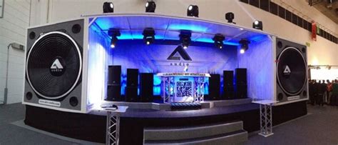 The Stage Is Set Up For An Event With Blue Lights And Speakers On Its