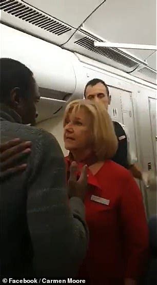 shocking moment aggressive passenger hits a female flight attendant in the face after she hit