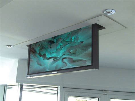 Outdoor television flat wall mounts. TV and projector lifter | Custom Audio Visual Solutions
