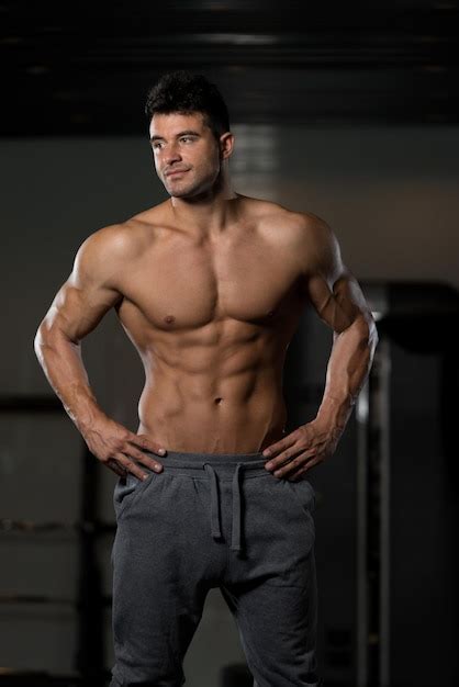 Premium Photo Man Showing Abdominal Muscle