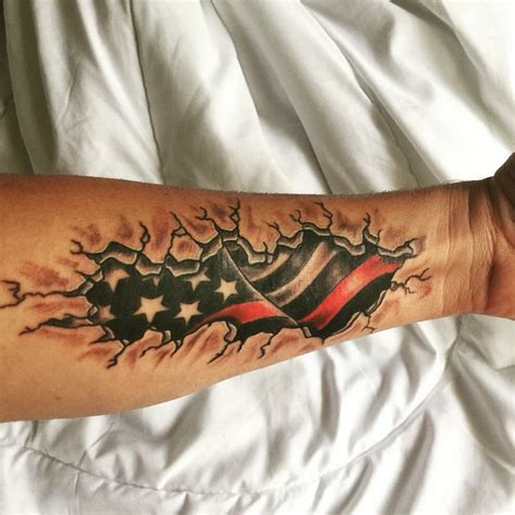 Thin Red Line American Flag Ripped Skin Tattoo Firefighter Tattoo