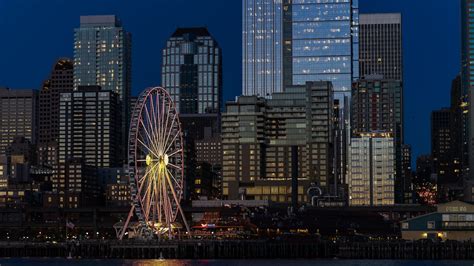 Skyline Photography Of High Rise Building During Nighttime · Free Stock