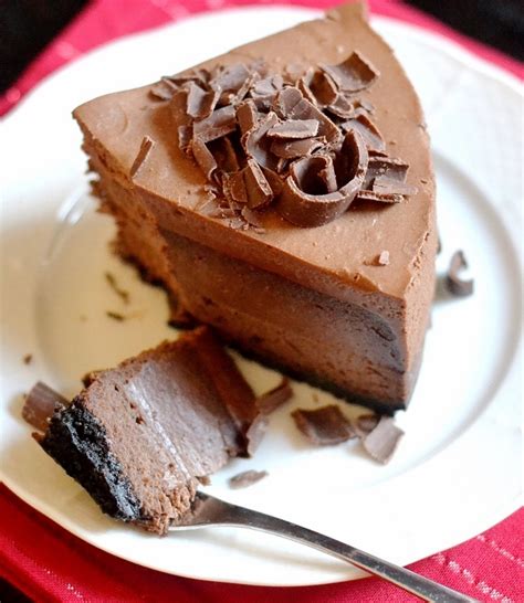 This cheesecake uses melted chocolate combined with cream cheese and whipped cream in an oreo cookie crust. Chocolate Cheesecake with Chocolate Mousse Topping | Bakes ...