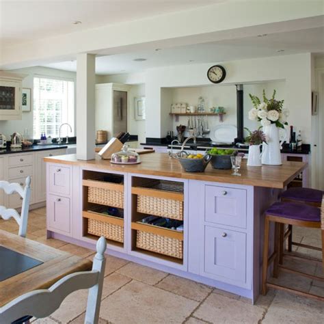 A central kitchen island is high on the wish list for most peoples dream kitchen layouts. Purple kitchen island | Kitchen idea | housetohome.co.uk