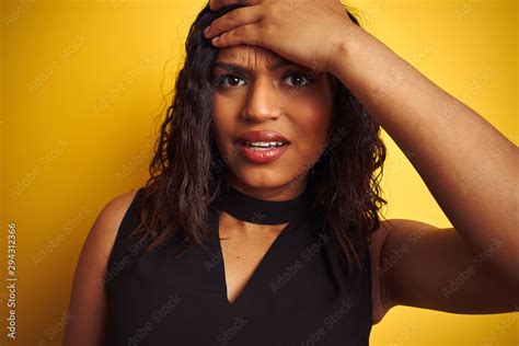 Transsexual Transgender Woman Wearing Black T Shirt Over Isolated Yellow Background Stressed