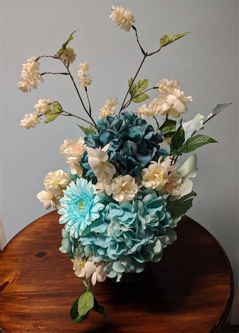 The cost of prom flowers depends on the flower varieties used, the number of stems and complexity of the design. Silk flower arrangement. | Etsy | Silk flower arrangements ...
