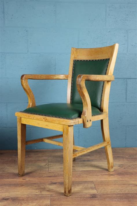 It is usually a swivel chair, with a set of wheels for mobility and adjustable height. 1930s Oak Desk Chair - Antiques Atlas