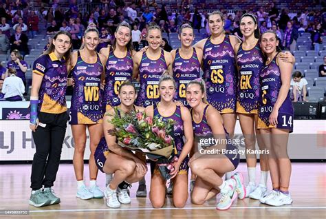 lara dunkley of the firebirds poses for a photo with her team mates news photo getty images