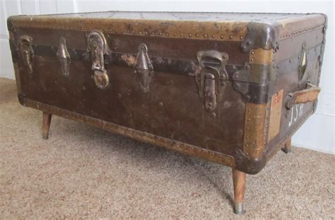 Most coffee tables are between 12 inches and 18 inches high, and so are many steamer trunks. Steamer Trunk Coffee Table!