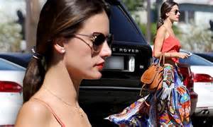 Alessandra Ambrosio Flashes Peek At Her Toned Tummy As She Heads To Day