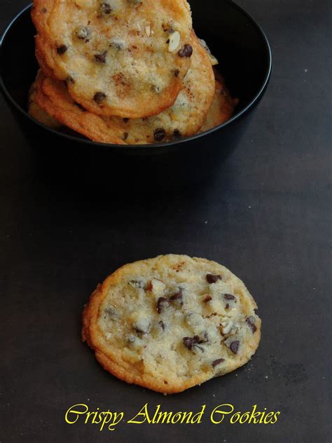 Gluten free, sugar free, no milk, no flour, what else. Priya's Versatile Recipes: Eggless Crispy Almond Cookies With Chocolate Chips/Thin Almond Cookies