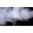 Water Vapor White Jet Of Vapour Steam On Black Background Slow Motion 