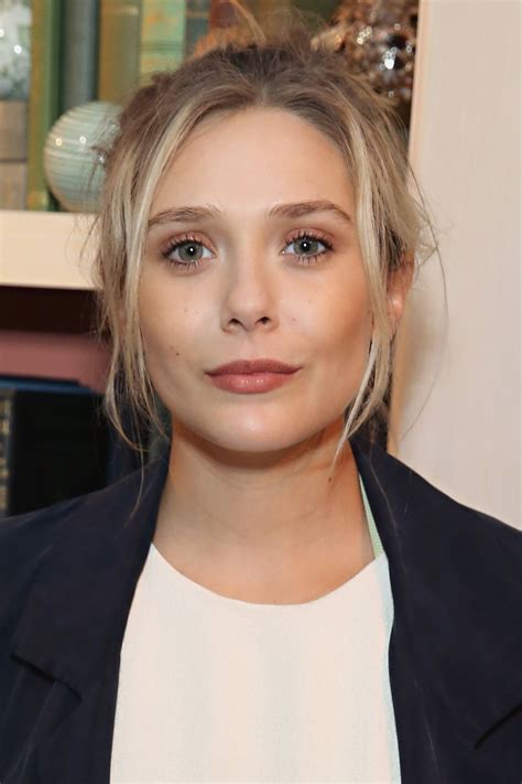 Elizabeth dazzled in a daring red sheer lace zuhair murad dress that showed off her stunning physique at the 33rd film independent spirit awards in los angeles on saturday. Elizabeth Olsen - 'I Saw The Light' Portraits, October ...