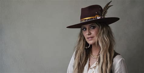 Heart Like A Truck Lyrics Explained: Lainey Wilson’s Journey of Passion width=