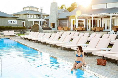 Woman Enjoying The Pool At Luxury Resort By Stocksy Contributor Trinette Reed Stocksy