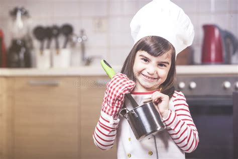Little Girl Chef In The Kitchen Stock Image Image Of Child Chef