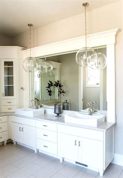It isn't meant to add ambiance to a room but to assist in the tasks that you perform there. Hanging Pendant Lights Over Bathroom Vanity - Bathroom ...