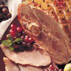 Baked ham with brown sugar glaze made with brown sugar, orange juice, honey, and spices is the perfect sweet and savory holiday dinner, and bakes in only 90 minutes! Baked Ham with Brown Sugar Glaze