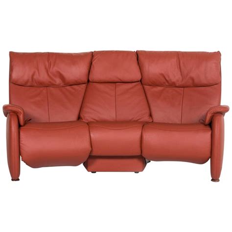 These bear their own unique relax functions and firmness settings. Himolla Trapeze Leather Sofa Orange Three-Seat Relax ...