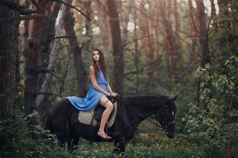 Beautiful Woman Riding Horse In Forest Featuring Dress Horse And Girl