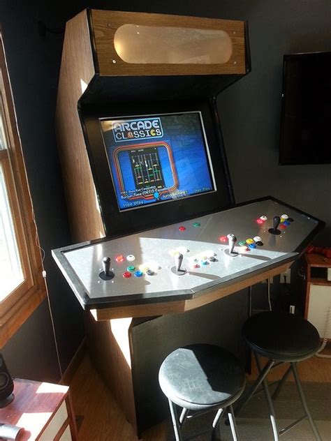 Maybe you would like to learn more about one of these? my first cabinet build (4-player upright) : MAME