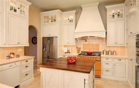 White kitchen cabinets with wood floors. What You Should to Know about French Country Kitchen ...