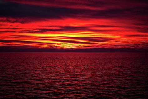 Deep Red Sunset Over The Eastern Mediterranean Sea Photograph By Tom