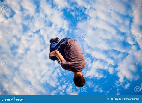 Young Man Doing Backflip Trick In The Air Stock Image Image Of