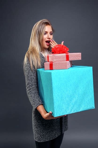 Premium Photo Surprised Woman With Present Boxes