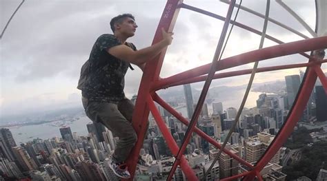 Video Russian Couple’s Daredevil Selfies Atop Hong Kong’s Highest Crane Are Breathtaking