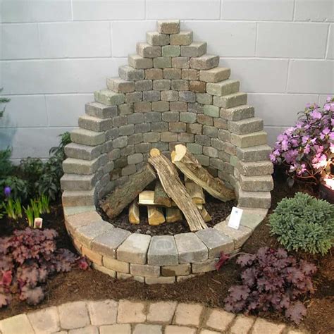 To build a backyard fire pit with bricks, start by digging a circular hole that's 4 feet in diameter and 12 inches deep. How to Be Creative with Stone Fire Pit Designs: Backyard DIY