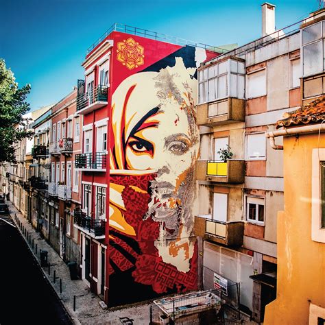 Not all are is mtsk art. Vhils & Obey Giant Collaborate in Lisbon - Street Art ...