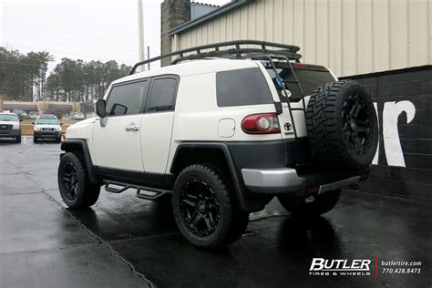 Lifted Toyota Fj Cruiser With 20in Black Rhino Cog Wheels And Toyo Open