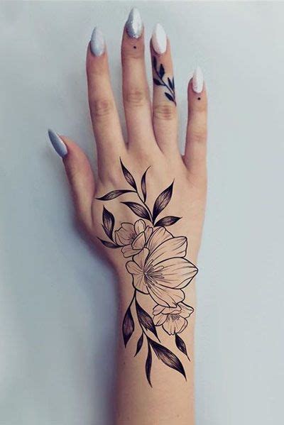 25 Awesome Hand Tattoo Designs Hand Tattoos Hand Tattoos For Women