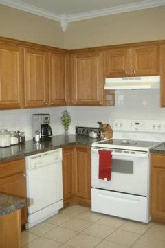 There are two ways of tackling your wall color suggestions: paint colors with honey oak cabinetry