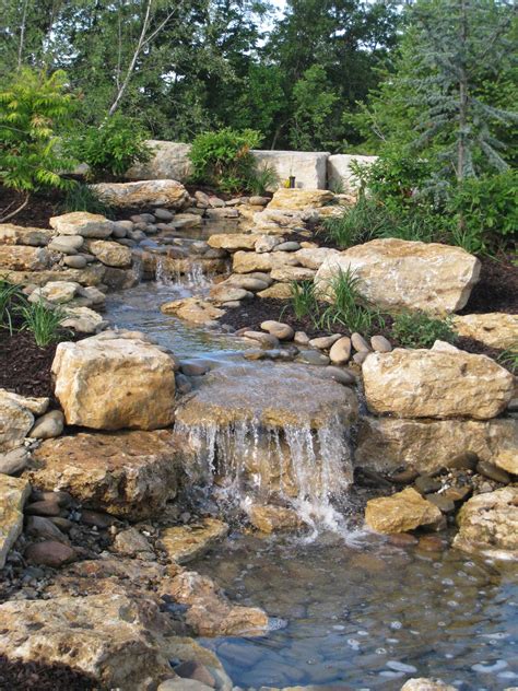 Welcome to landscaping fountains and water bubblers. Water Feature Design & Installation in Kansas City ...